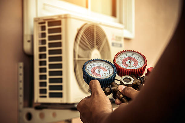 Professional Heat Pump Repair technician working in Waltham, MA